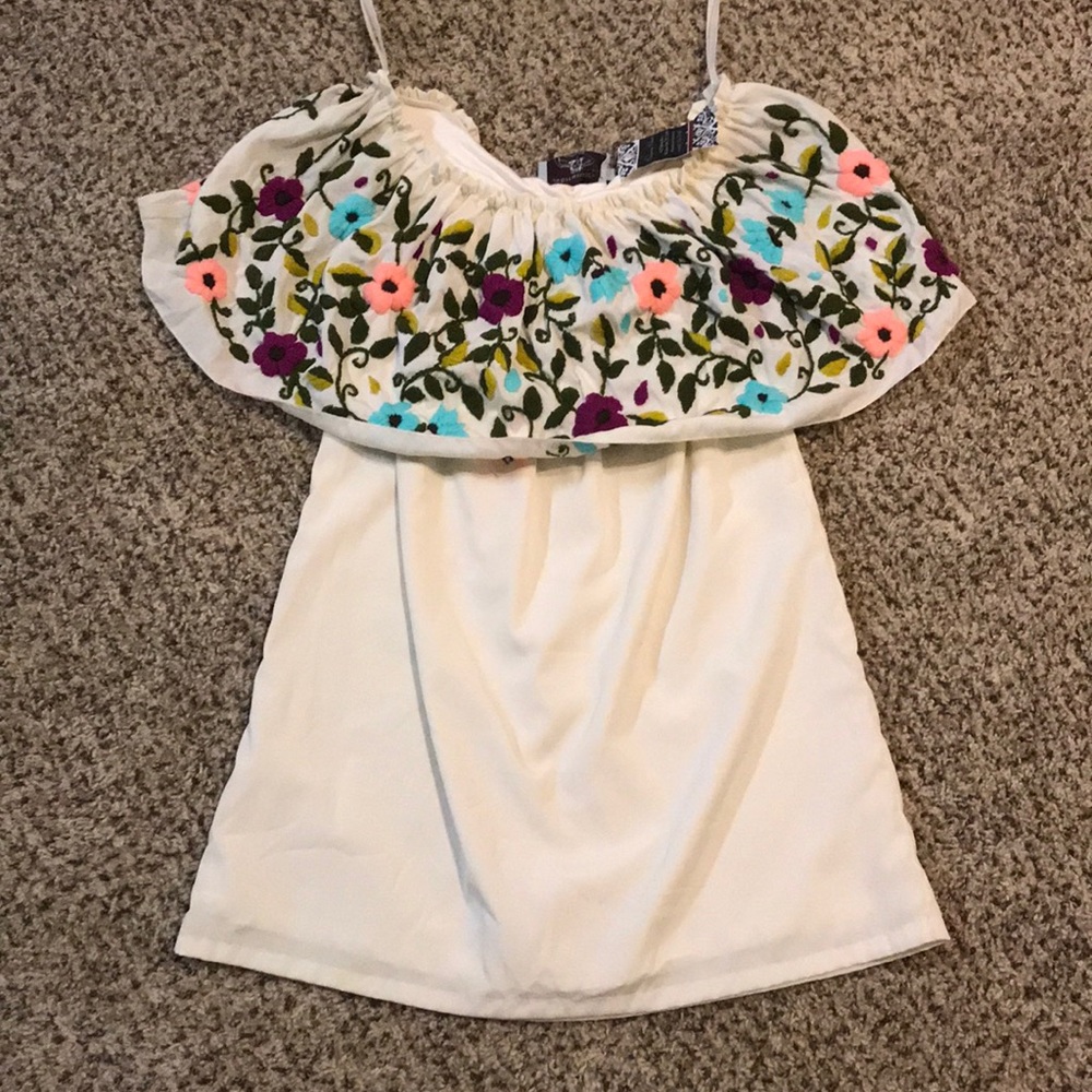 Off the shoulder dress.